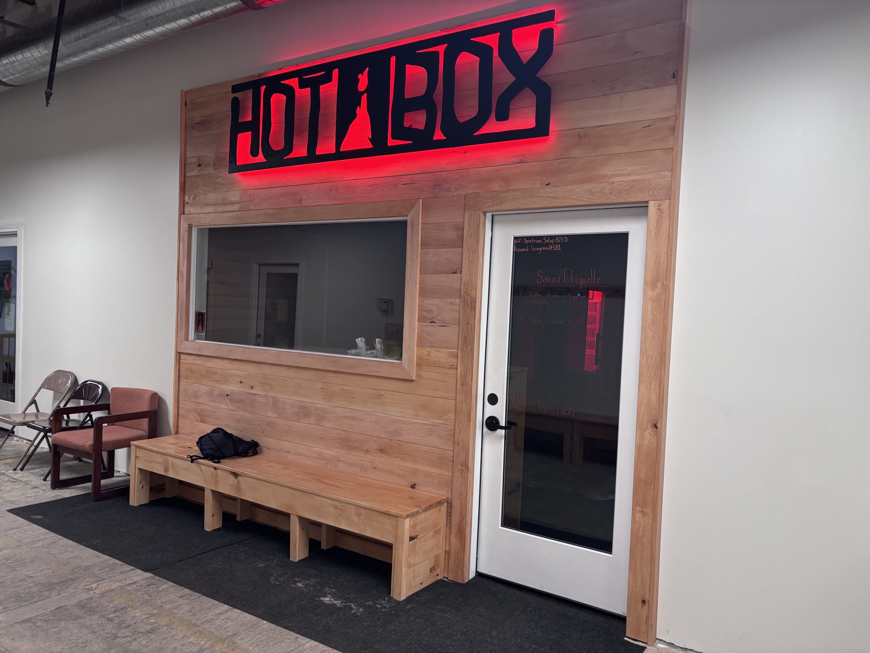 Hot Box Interior — Cedar Bench, Salt-Block Glow, Towel Folded on Rail